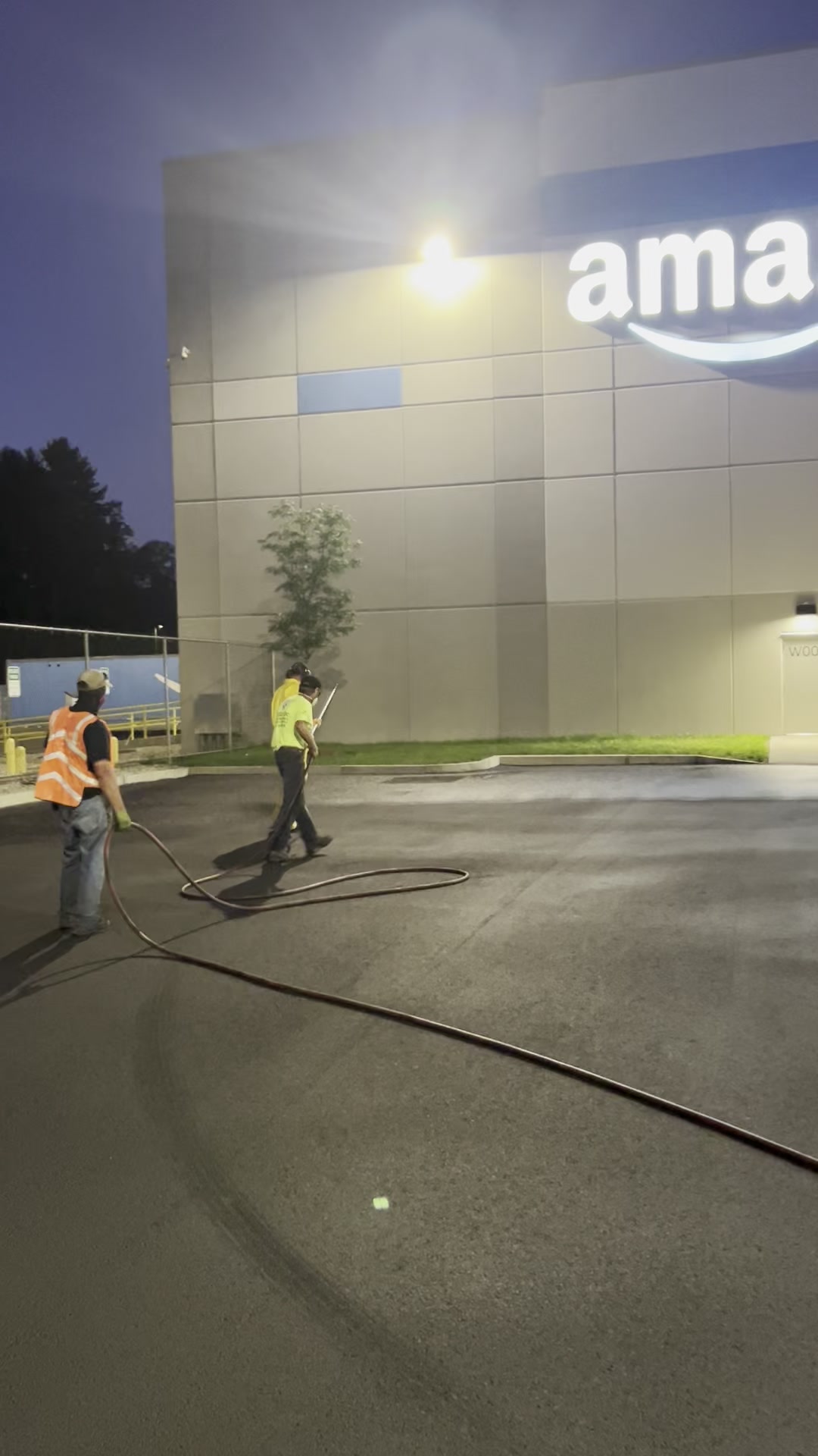 Warehouse parking lot at night